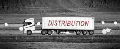 Truck driving through a rural area - Distribution Stock Photos