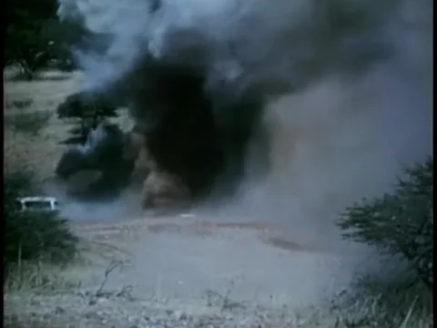 Truck exploding due to hitting explosive container 스톡 동영상 260258113