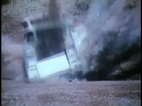 Truck filled with boxes of dynamite exploding, 1970s Stock Footage 64820131
