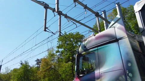 Truck on german eHighway - Interstate with electric overhead wire POV Stock Footage 146491034