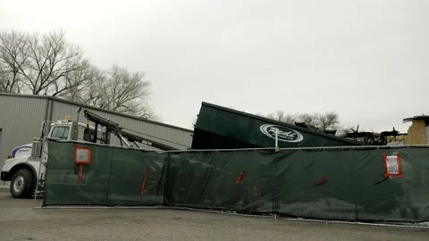 Truck loading dumpster fast-motion Stock Footage 234084545