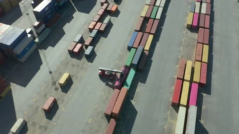 Truck loading &amp; transporting containers at cargo port terminal. Stock Footage 131142866