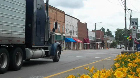 Truck on Main Street in Small Town America Stock Footage