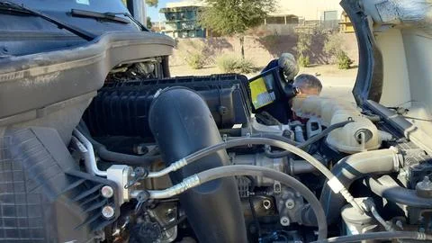 🔧 Truck Maintenance: Driver Refilling Coolant Liquid Stock Photos