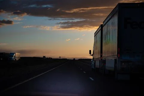 Truck Moving on Down the Interstate at Sunset Foto stock
