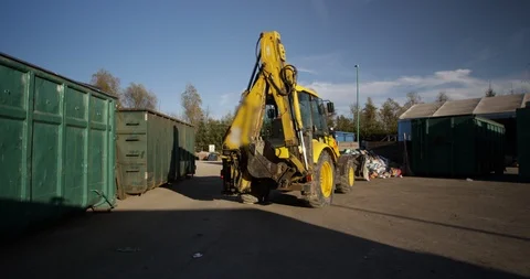 Truck Moving Garbage Into Recycling Bin Stock Footage 125364914