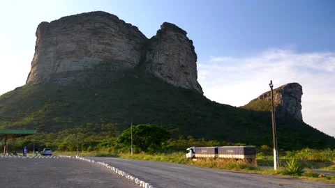 Truck passing in front of Morro do Pai Inacio Canyon, Brazil. Stock Footage 154114434