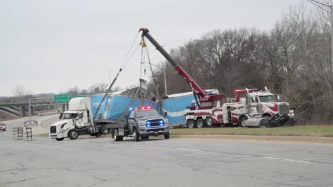 Truck pulling Amazon Prime trailer flipped over in accident Video stock 244348301
