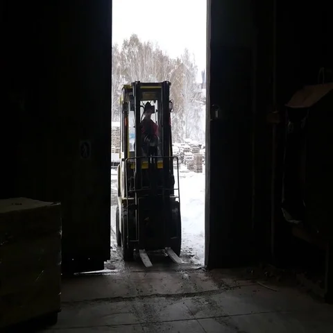 Truck pulls into a warehouse Stock Footage 69599001