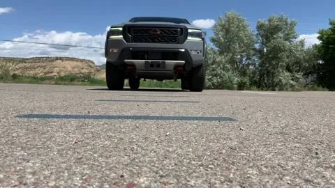 Truck in reverse on pavement Stock Footage 200798694