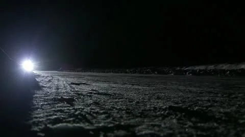 A truck on the road a winter night Stock Footage