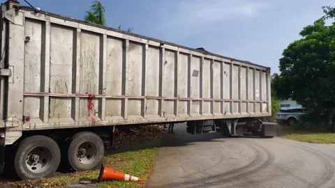 A truck that is sitting on the side of a building Stock Footage 155540075