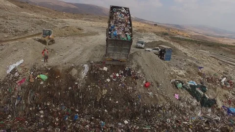 Truck throw garbage landfill aerial 4K Stock Footage