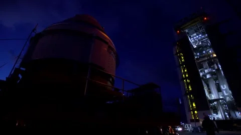 Truck transporting Boeing OFT-2 Starliner spacecraft at night Stock Footage 274264864