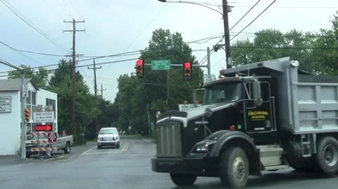 Truck turns in front Stock Footage 8601780