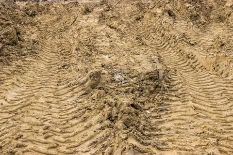 Truck tyre pattern on the soil background Stock Photos