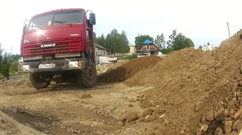Truck unloading on building site Stock Footage 11870474