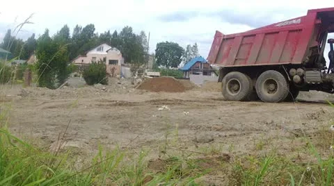 Truck unloading on building site Stock Footage 11887148