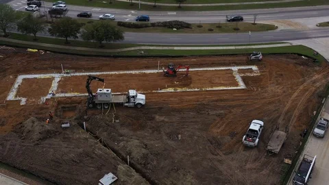 Truck Unloading a Grease Trap on a Construction Site, Bryan, Texas, USA Stock Footage 129395357