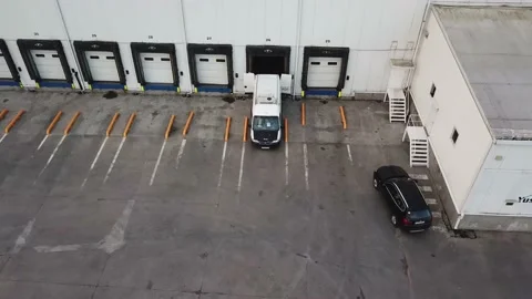 Truck Waiting On Loading Dock Of Warehouse Video stock 156571799