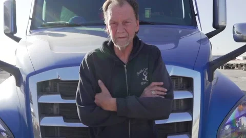 Trucker shaking his head no pointing at camera in disgust Video stock 170167378