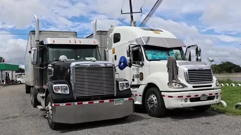 Truckers stranded in Panama due to mining crisis denounce "inhumane" conditions, Stock Footage 256703414