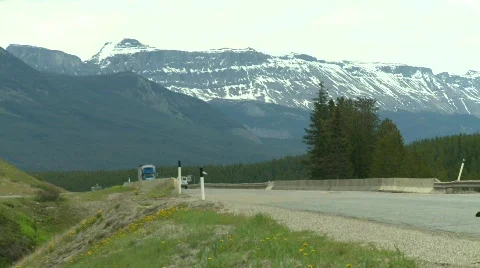 Trucking, highway traffic, mountain, trucks and cars Stock Footage