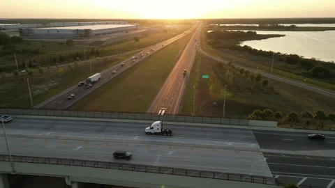 Trucks and car on the road. interstate highway. road infrastructure Stock Footage 241937079