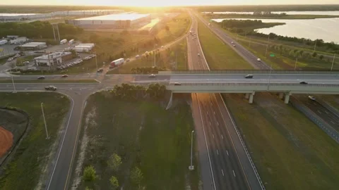 Trucks and car on the road. interstate highway. road infrastructure 動画素材 241937526