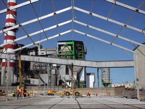 Trucks and crane building structure Stock Footage