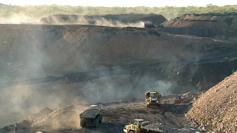Trucks and machinery on an open coal mine Stock Footage 113683381