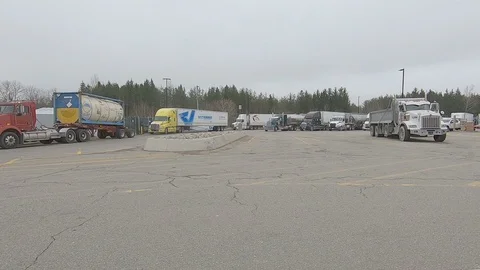 Trucks and semi tractor trailers at truck stop Stock Footage 107381012