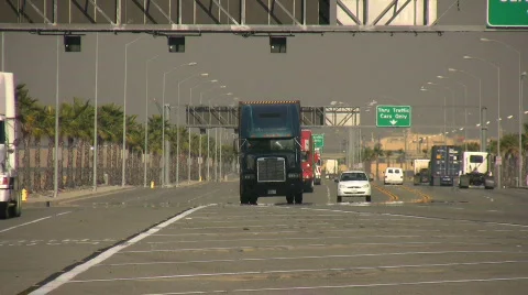 Trucks approaching Stock Footage 281674