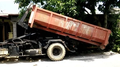 Trucks are lifting the bin that can be removed for solid waste disposal. Stock Footage 89466494