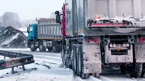Trucks are sent to load coal. Truck goes on the hard work in the coal cut Stock Footage 199486766
