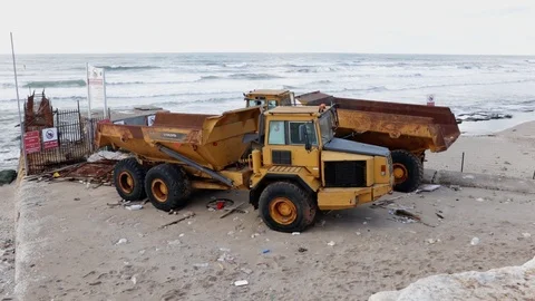 Trucks on the beach Stock Footage 125403321