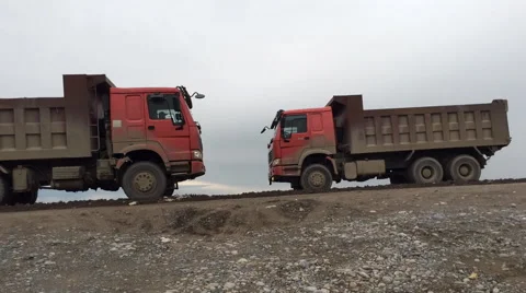 Trucks on a career Stock Footage 63320693