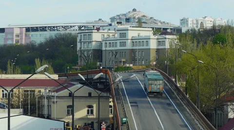 Trucks driving along a bridge to the cargo port. View from above. Stock Footage 37435039