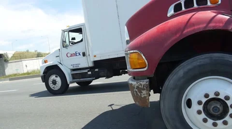 Trucks driving on highway Stock Footage 68443842