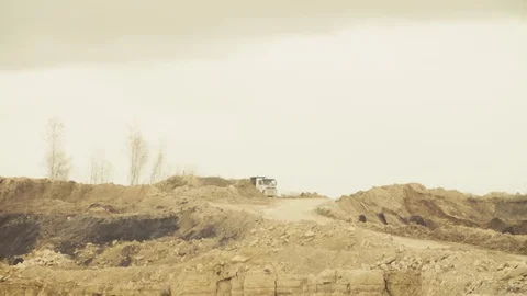 Trucks driving on a road in quarry Stock Footage 75472357