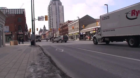 Trucks driving through a down town main street. Stock-Footage 35629913