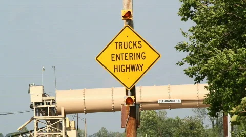 Trucks entering high Stock Footage 800094