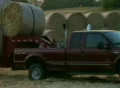 Trucks Hauling Hay Bales SD Footage