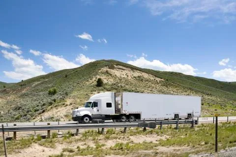 Trucks on interstate. Stock Photos