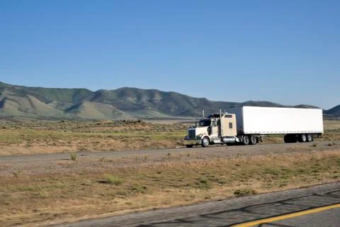 Trucks on interstate. Stock Photos