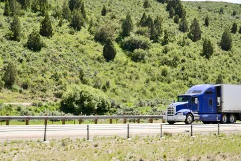Trucks on interstate. Stock Photos