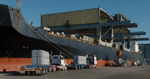 Trucks lining up to export aluminum from Australian port Stock Footage 86848039
