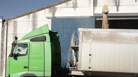 Trucks loading cereal seeds. Stock Footage 27486302