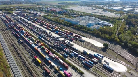 Trucks Moving Between Containers at Munich-Riem Rail Freight Terminal Video stock 347906558