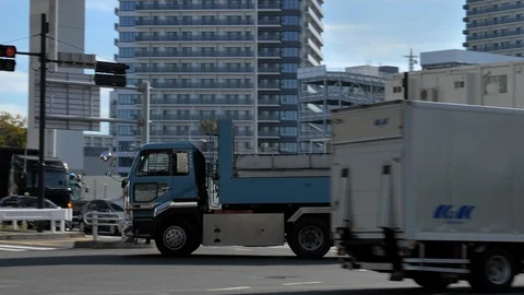 Trucks passing through the highway in Tokyo Japan Stock Footage 120911651